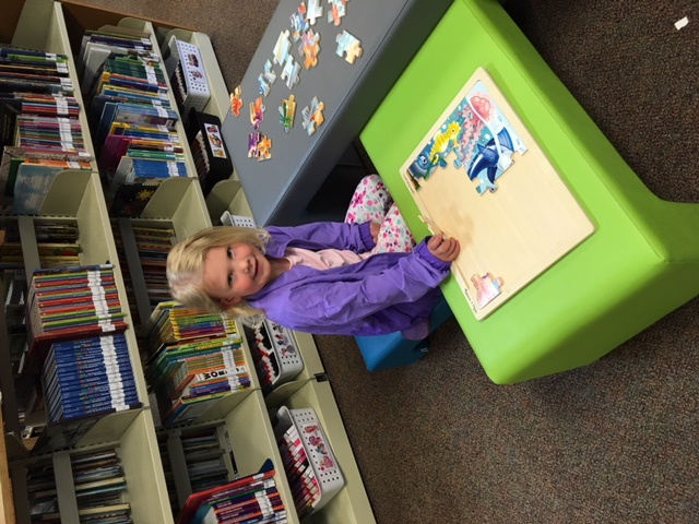 child enjoying after school program at Sibley Public Library
