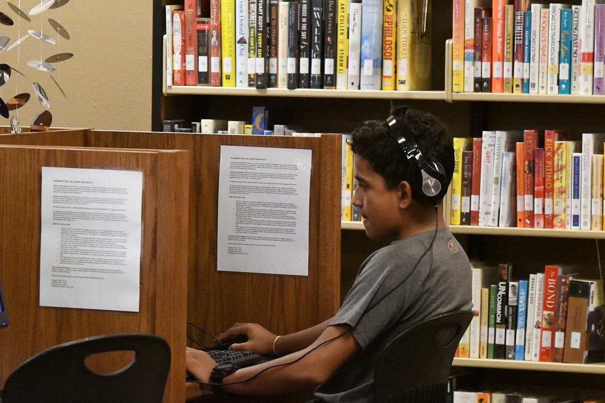boy using computer at the Sibley Public Library